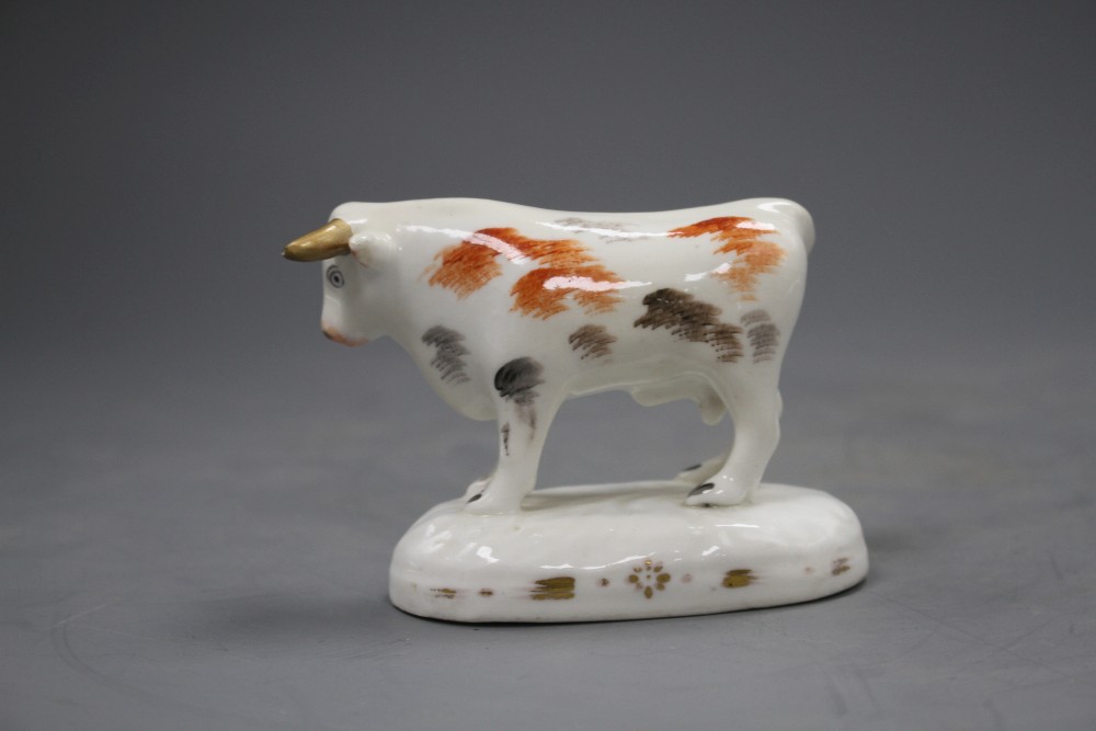 A Staffordshire porcelain figure of a standing bull, c.1830-40, L.9.5cm